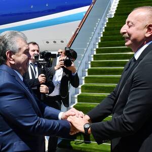 Ilham Aliyev visits Uzbekistan and meets with his counterpart